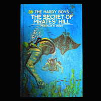 36 The Secret of Pirates' Hill (1956/1972-YN):  Hardy Boys Book Blue-Back image 0
