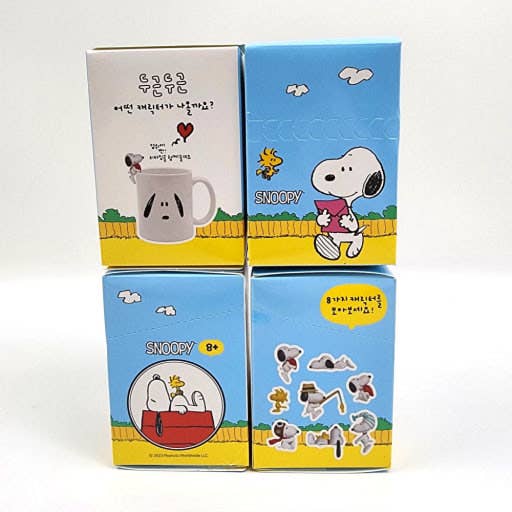 K-Wonderland Peanuts Snoopy blind box packaging showing Snoopy and Woodstock illustrations with figure previews