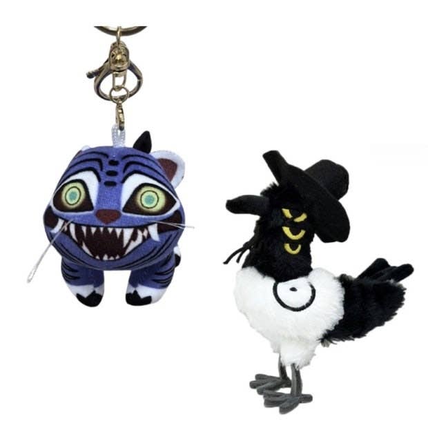 K-Wonderland plush keyrings featuring a fierce blue tiger and a stylized black and white magpie with hat accessory