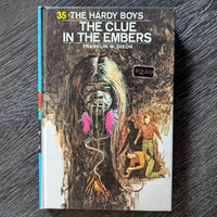 35 The Clue in the Embers (1972):  Hardy Boys Book Blue-Back image 0