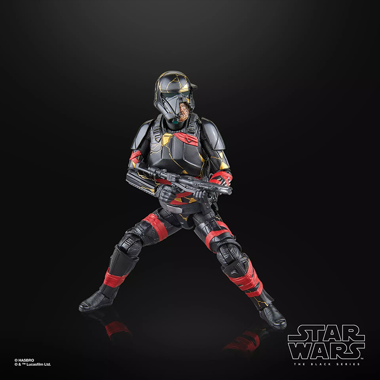 Hasbro Star Wars Black Series Night Trooper action figure with red and gold details holding blaster in dynamic pose