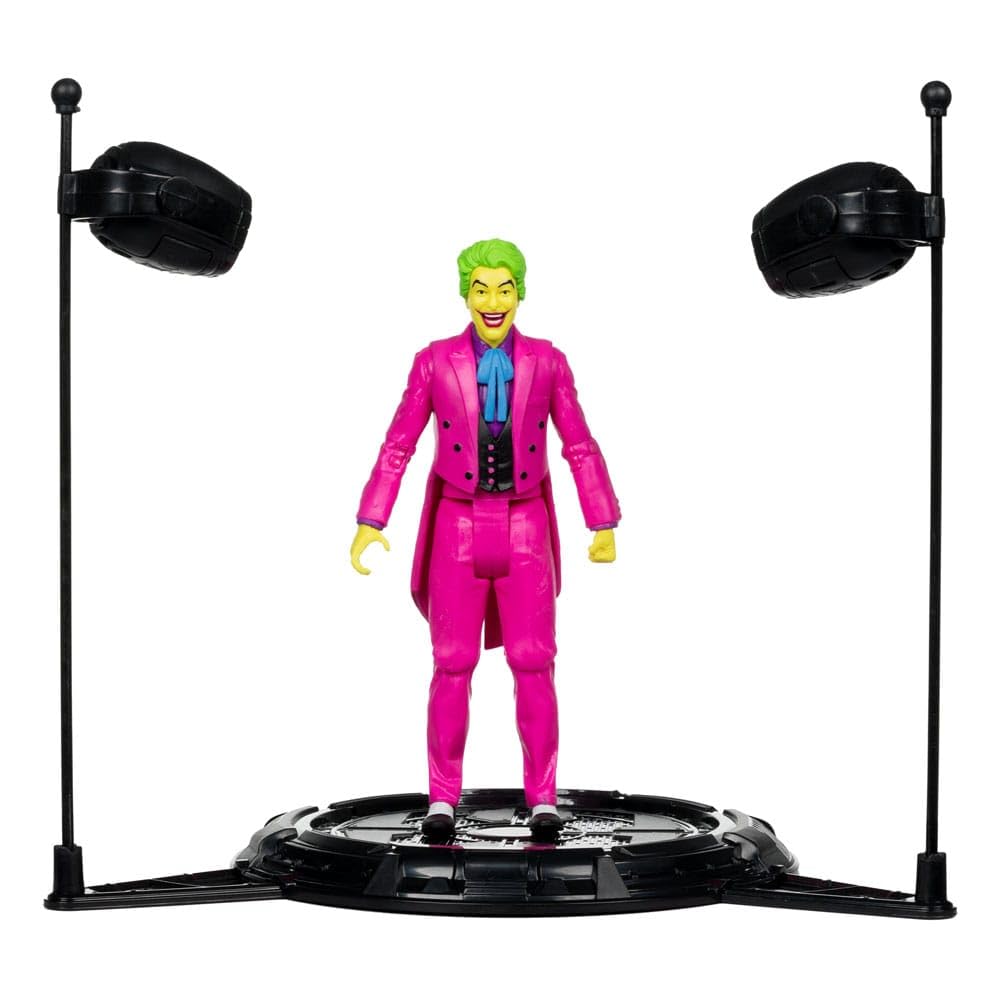 The Joker Black Light Gold Label Mcfarlane Action Figure 6" with bright suit and two black light stands by McFarlane.