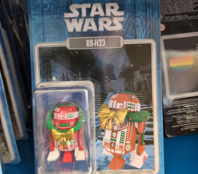 R8-H23 Star Wars Droid Factory Christmas action figure with wreath and bow, collectible by Disney.