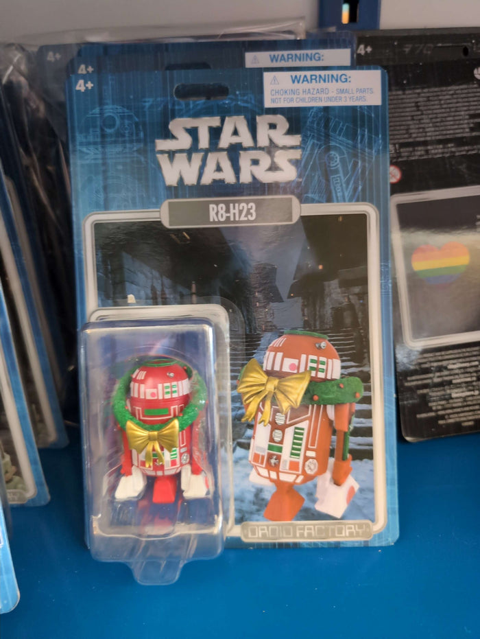R8-H23 Star Wars Droid Factory Christmas action figure with wreath and bow, collectible by Disney.