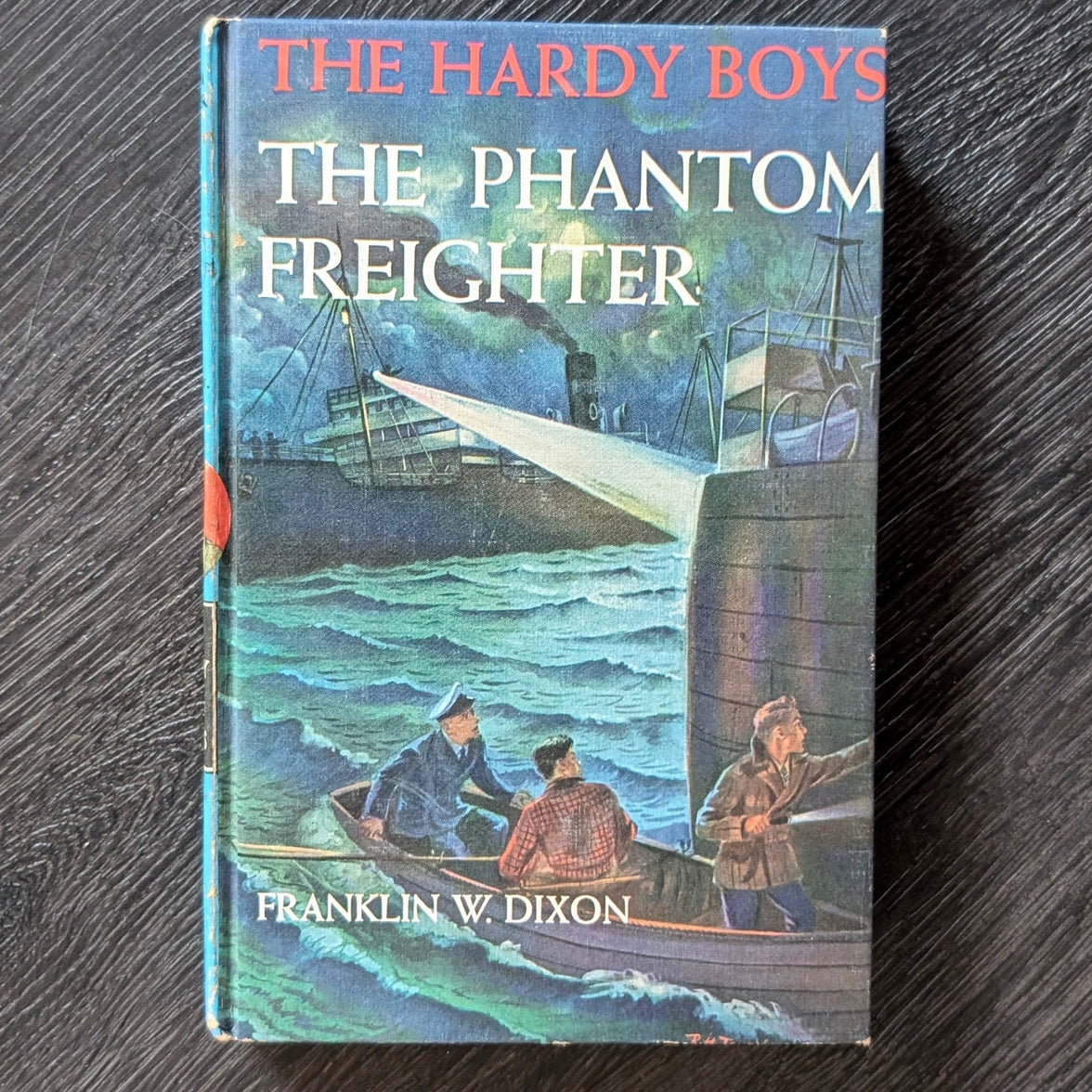 26 The Phantom Freighter (1947):  Vintage Hardy Boys Book Blue-Back image 0