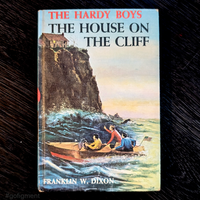 02 The House on the Cliff (1959):  Vintage Hardy Boys Book Blue-Back image 0