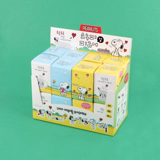 K-Wonderland Peanuts Snoopy blind box set showcasing colorful packaging with playful Snoopy illustrations and various figure designs