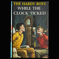 11 While the Clock Ticked (1931):  Vintage Hardy Boys Book Blue-Back image 0