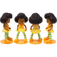 Boss Fight Studio Llc Orange Blossom figure with curly hair, yellow dress, green striped tights, and orange shoes on display bases