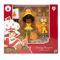 Boss Fight Studio Llc Orange Blossom 1:12 figure with curly hair, yellow hat, striped stockings, and Marmalade pet in display box