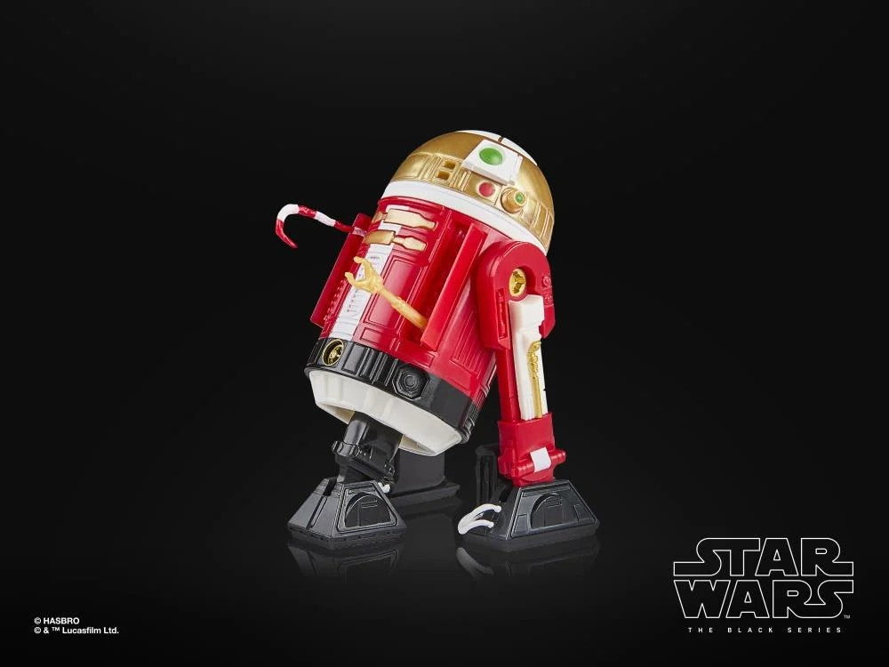 Star Wars The Black Series Holiday Edition astromech droid action figure by Hasbro holding a candy cane on black background