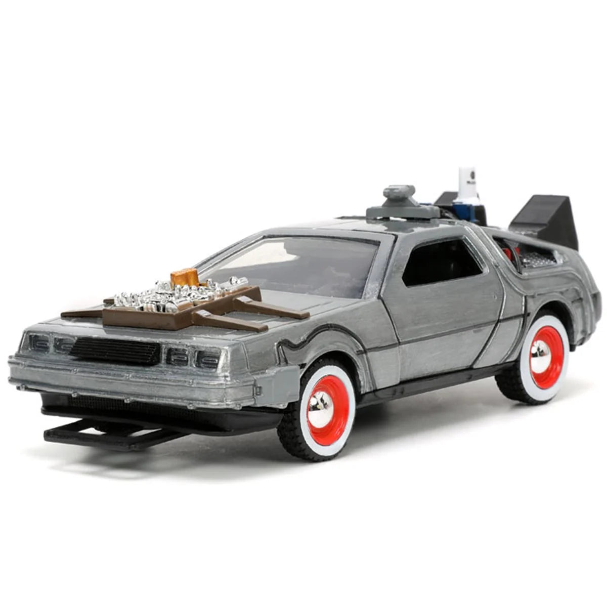 Gray time machine car with red and white wheels, roof-mounted equipment, and exposed mechanical details