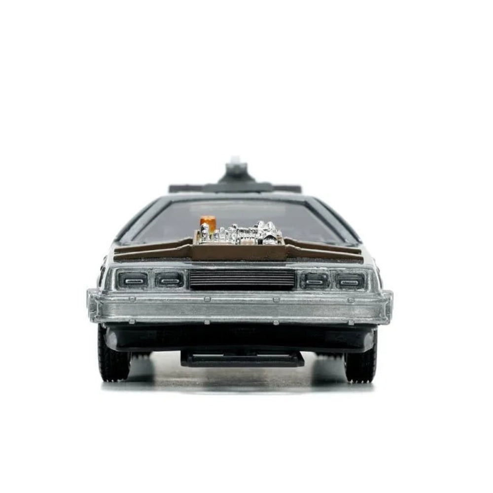 Rear view of a silver toy car with visible taillights, bumper, and roof-mounted details