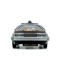 Rear view of a silver toy car with visible taillights, bumper, and roof-mounted details