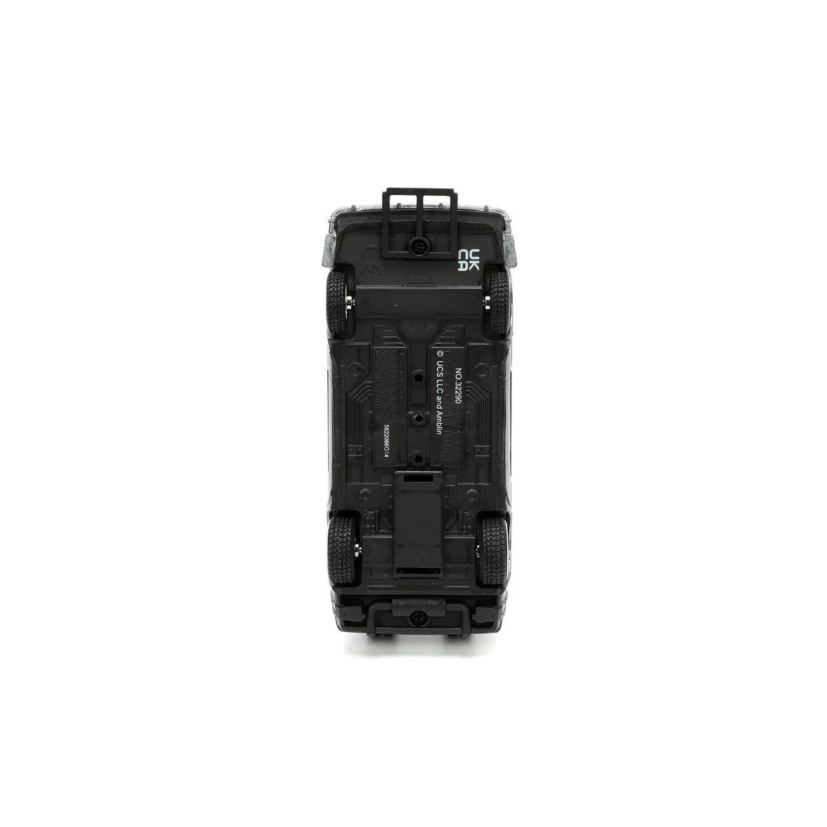 Underside view of a black toy car showing four wheels and molded chassis details