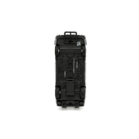 Underside view of a black toy car showing four wheels and molded chassis details