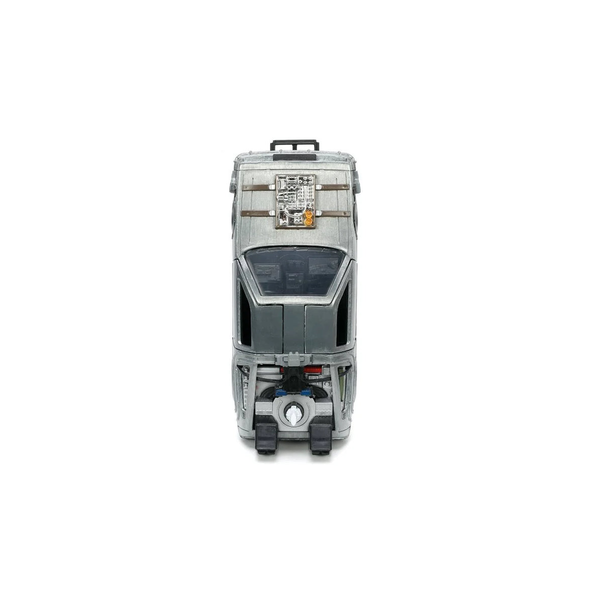 Front view of a gray futuristic toy vehicle with a windshield, top hatch, and front wheels