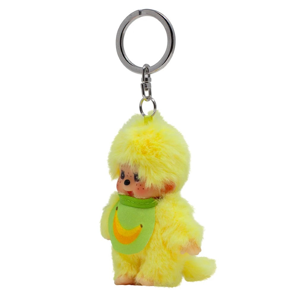Yellow fluffy chick keychain with a green bib and orange crescent detail