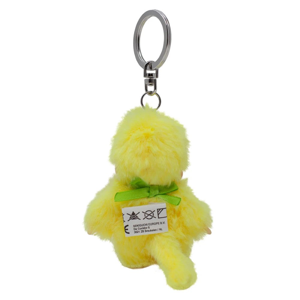 Yellow fluffy plush keychain with a green bow and metal ring attached to its head