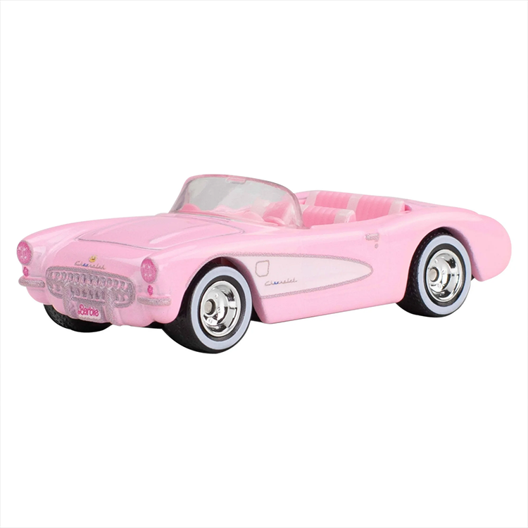 Pink 1956 Corvette Hot Wheels diecast car replica from Barbie The Movie with authentic chrome and whitewall tires.