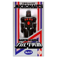 Boxed black robot figure with red details in Micronauts packaging
