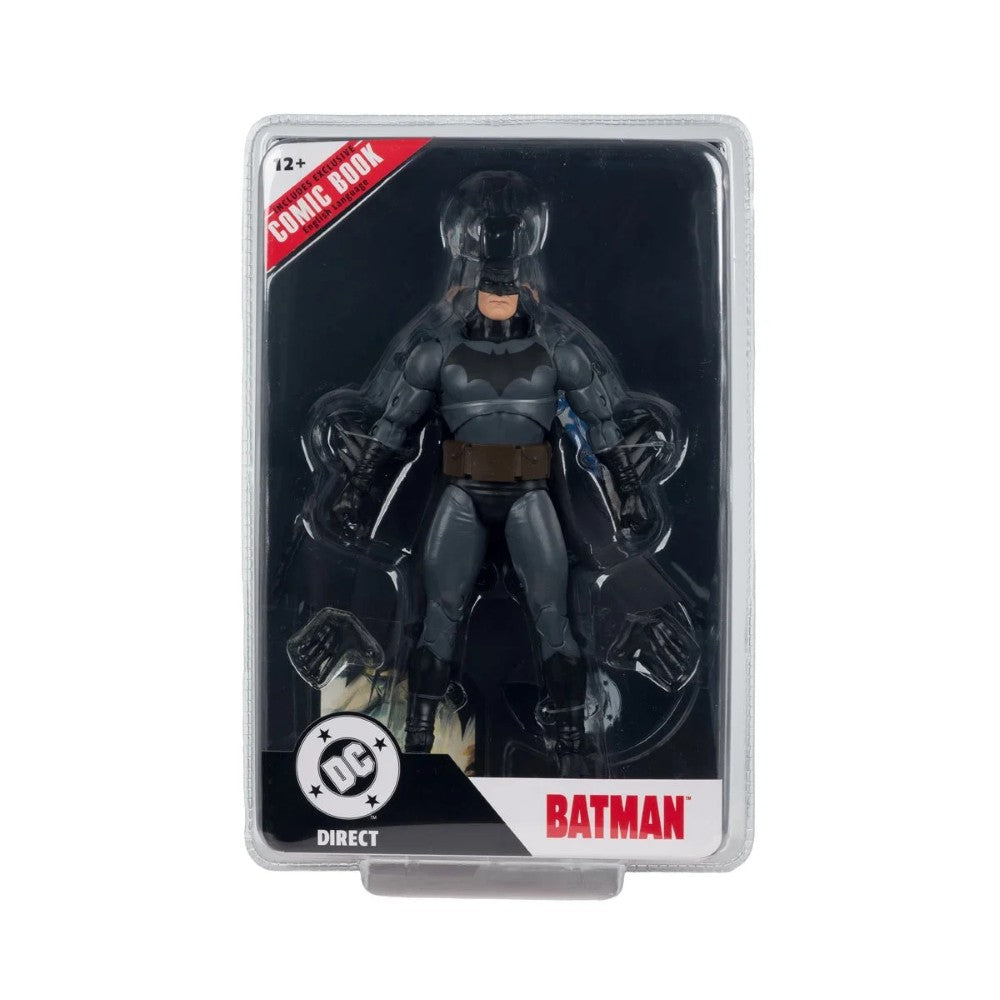 Batman action figure in dark grey and black suit with utility belt in clear packaging with DC Direct branding