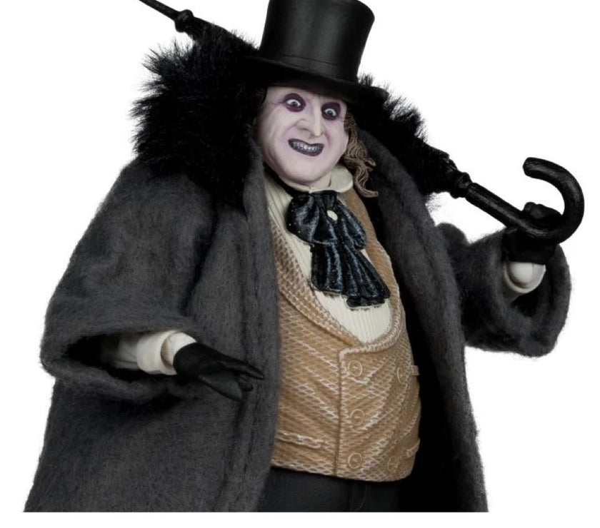 McFarlane Batman Returns The Penguin deluxe action figure wearing top hat and fur coat holding umbrella cane