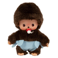 Stuffed toy resembling a baby with a brown fur outfit and blue diaper on a white background