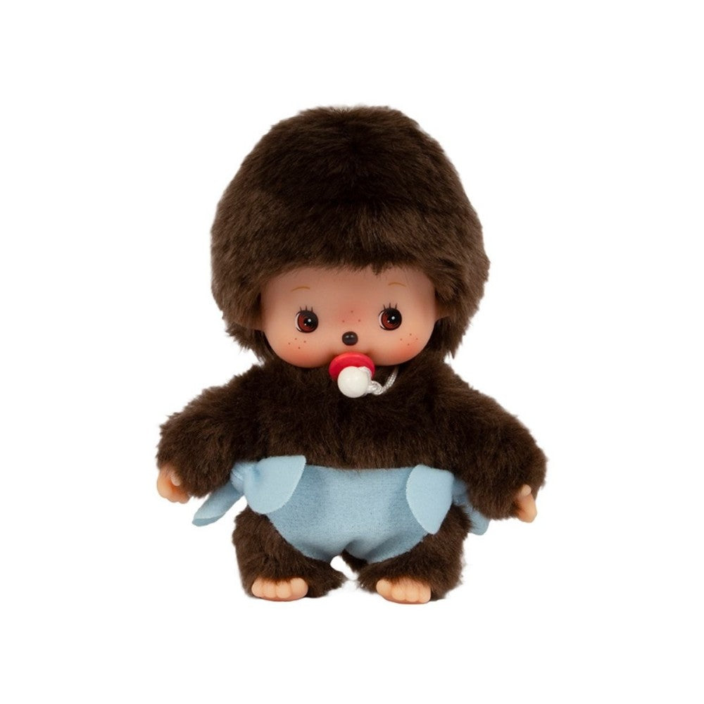 Stuffed toy resembling a baby with a brown fur outfit and blue diaper on a white background