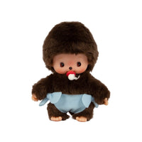 Stuffed toy resembling a baby with a brown fur outfit and blue diaper on a white background