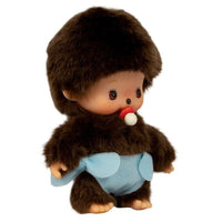 A small plush monkey toy with dark brown fur, a light blue diaper, and a red-and-white pacifier, photographed on a plain white background.
