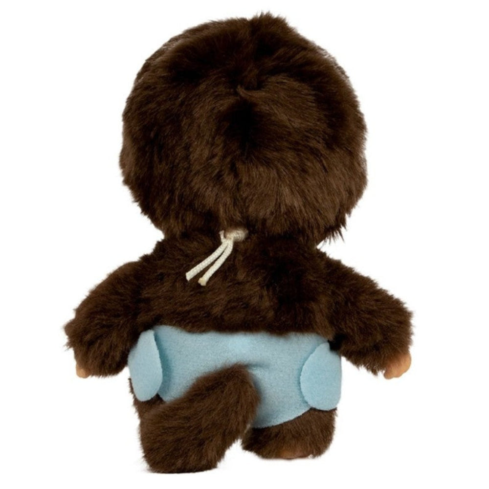 Brown plush toy with a blue diaper on a white background