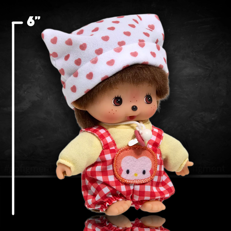 6-inch Sekiguchi Monchhichi Bebichhichi plush doll wearing red gingham overalls and white hat with pink hearts