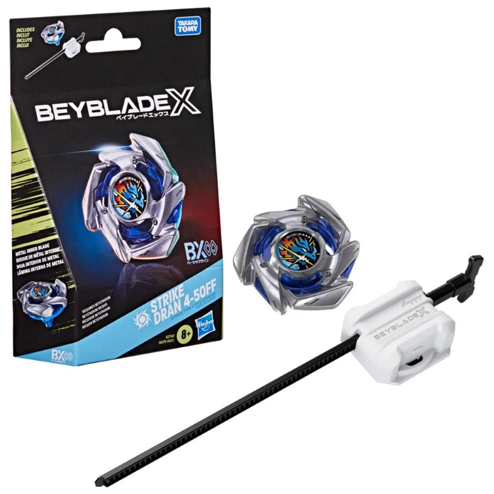 Beyblade X blue spinning top and launcher beside its retail box on a white background