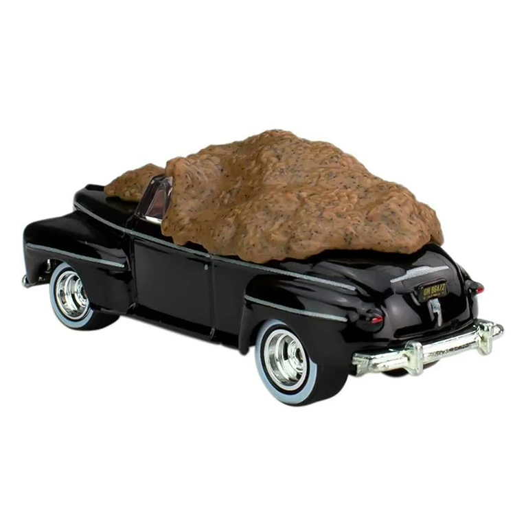 Mattel Hot Wheels 1:64 scale black Ford Super De Luxe diecast with detailed manure load from Back to the Future movie scene.
