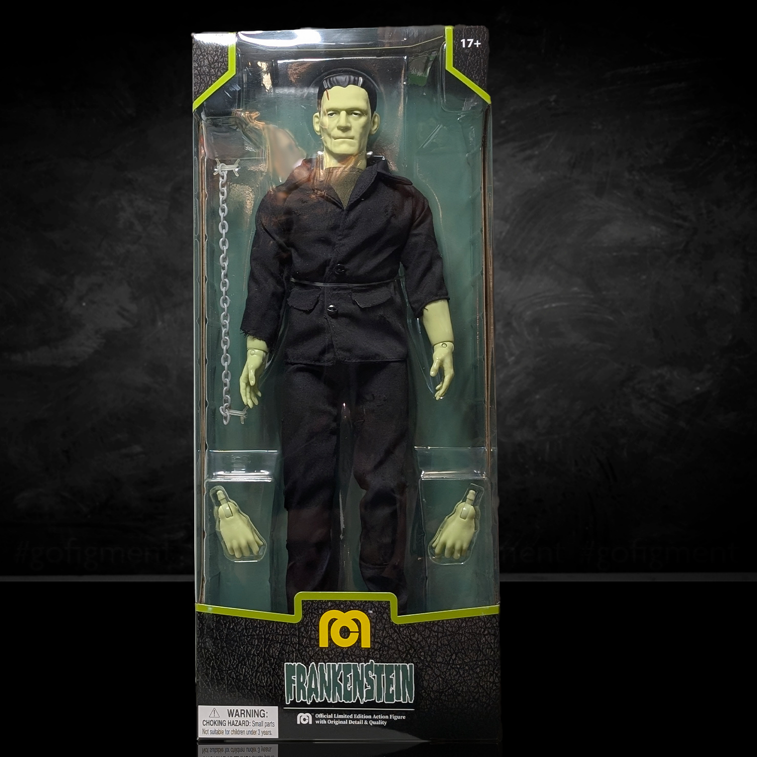 Mego Frankenstein 8-inch collectible figure in black outfit with extra hands and chain accessory in packaging