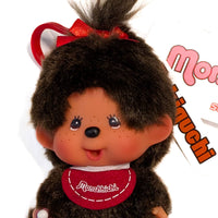 Sekiguchi Monchhichi Classic Big Head Girl Plush 4-inch mascot clip with red bib and smiling face close-up