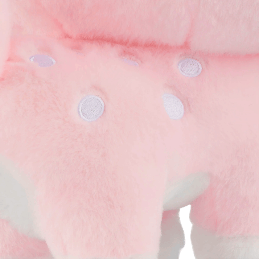 Close-up of Birduyen Speckle the pink deer plush with soft fur and white embroidered spots