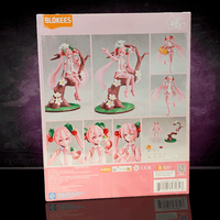 Blokees model kit featuring Sakura Miku in a cherry blossom scene with interchangeable expressions and accessories