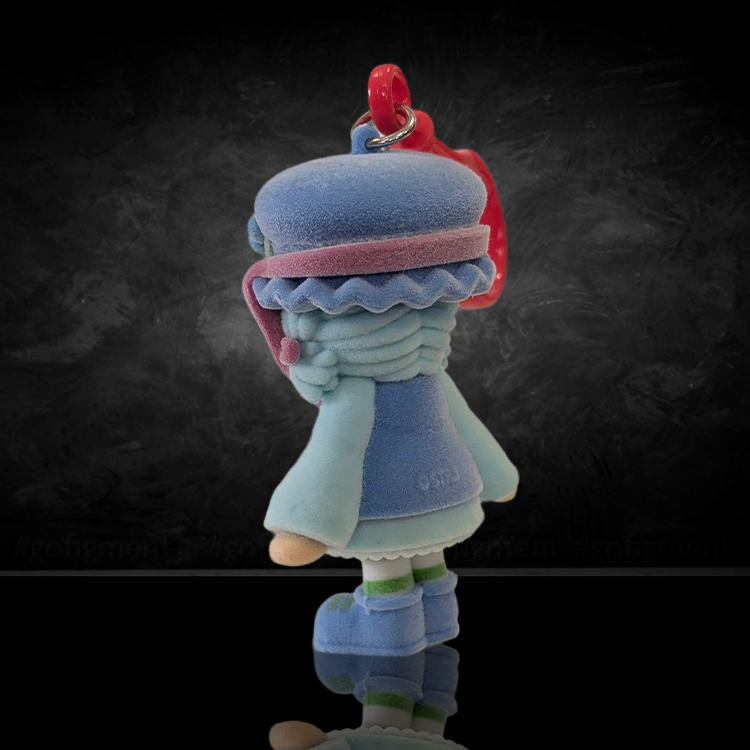UCC World of Strawberry Shortcake soft flocked mini figure clip in layered blue hat and coat with red clip attachment