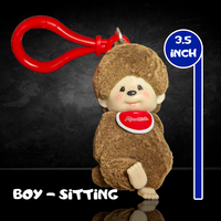 Sekiguchi Monchhichi 3.5-inch sitting boy figure bag clip with plush texture and red attachment clasp