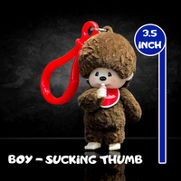 Sekiguchi Monchhichi 3.5-inch boy figure with plush texture sucking thumb and red clip bag charm