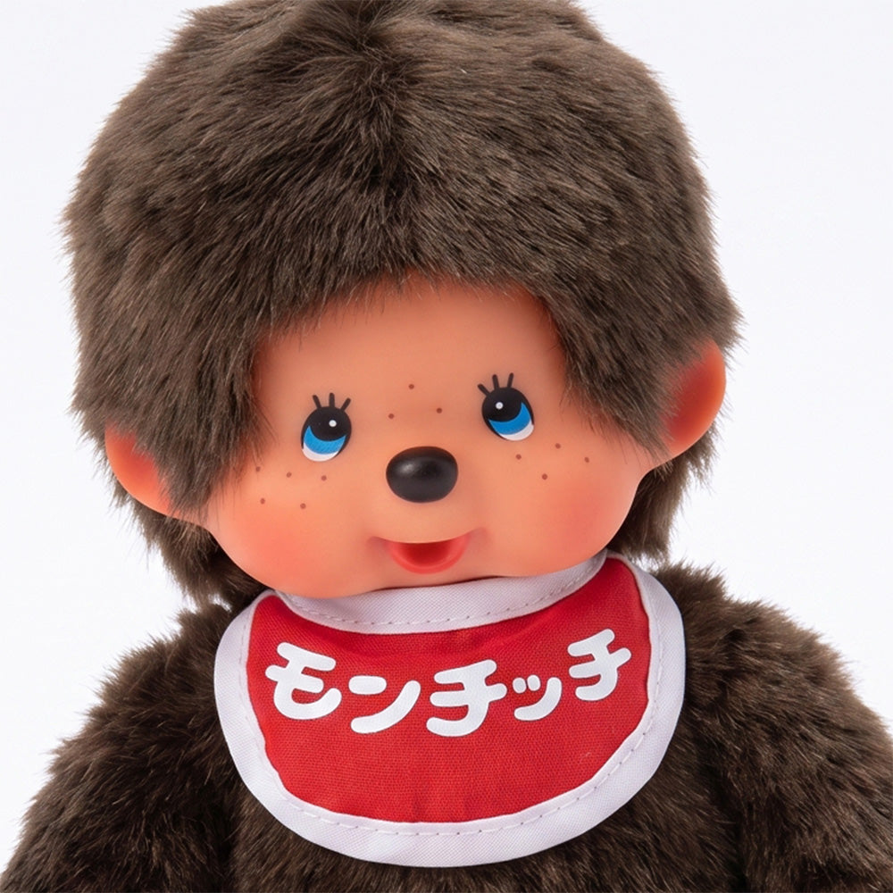 8" Monchhichi Classic Brown Boy in Red Bib with Japanese Character Logo and Blue Eyes by Sekiguchi