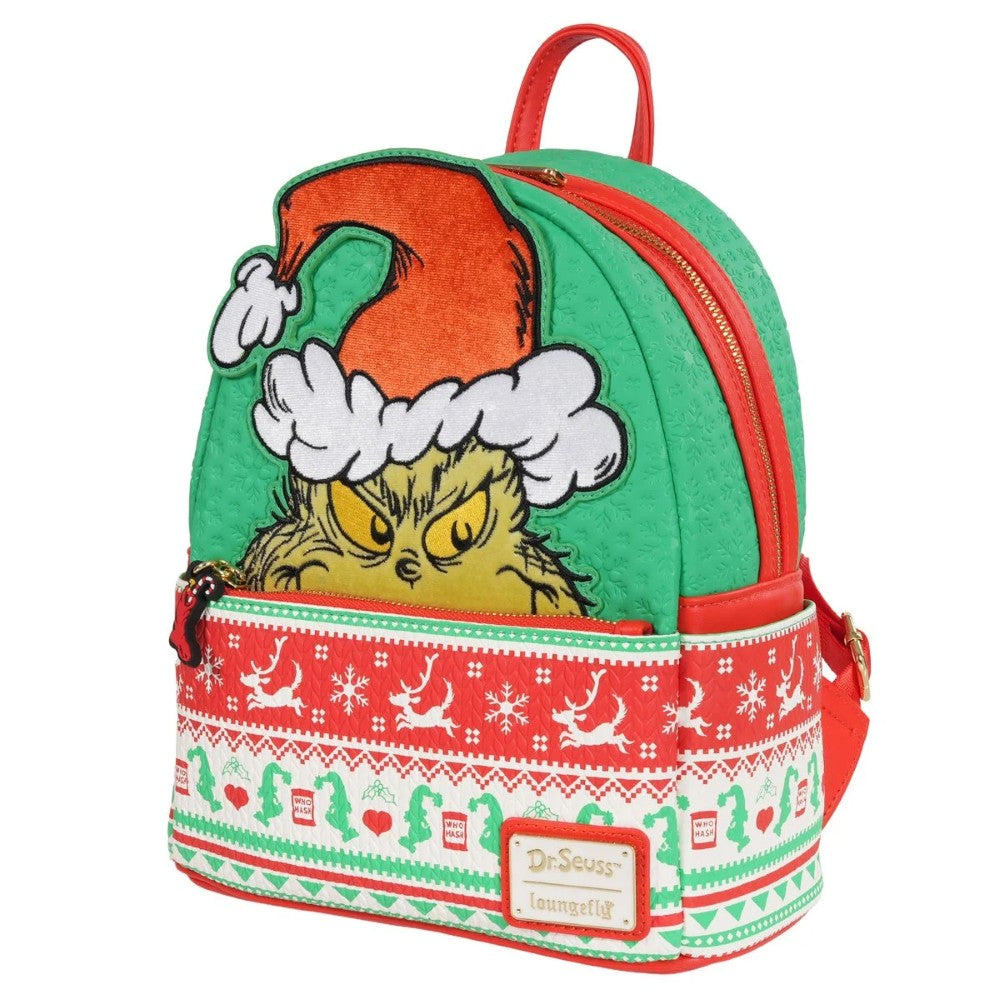 Loungefly mini-backpack with Grinch wearing Santa hat and festive red, green holiday sweater pattern