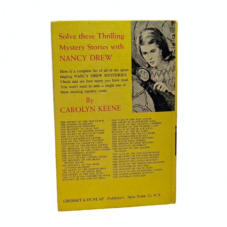 Back cover of 1947 Nancy Drew Mystery Stories book The Clue in the Old Album by Grosset & Dunlap Inc.