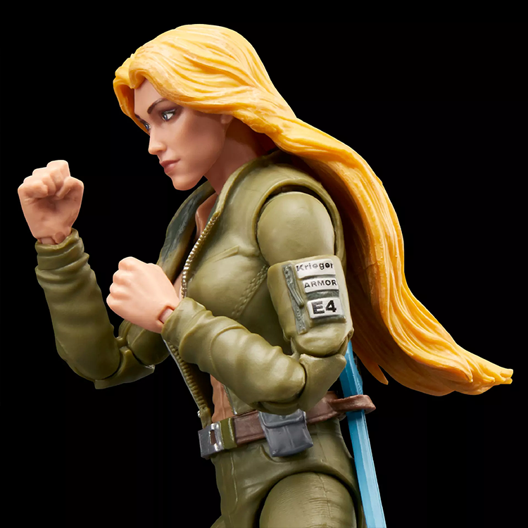 G.I. Joe Cover Girl action figure by Hasbro with long blonde hair and green military jacket in fighting pose