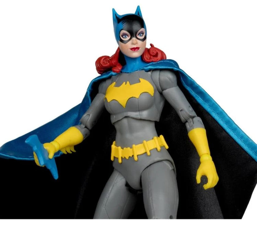 7 inch McFarlane DC Classic Barbara Gordon Batgirl action figure in gray suit with blue cape and yellow accents
