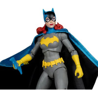 7 inch McFarlane DC Classic Barbara Gordon Batgirl action figure in gray suit with blue cape and yellow accents