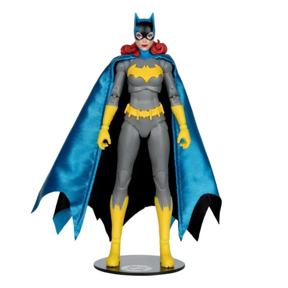 McFarlane DC Multiverse Batgirl action figure in gray suit with blue cape and yellow accents standing on display base