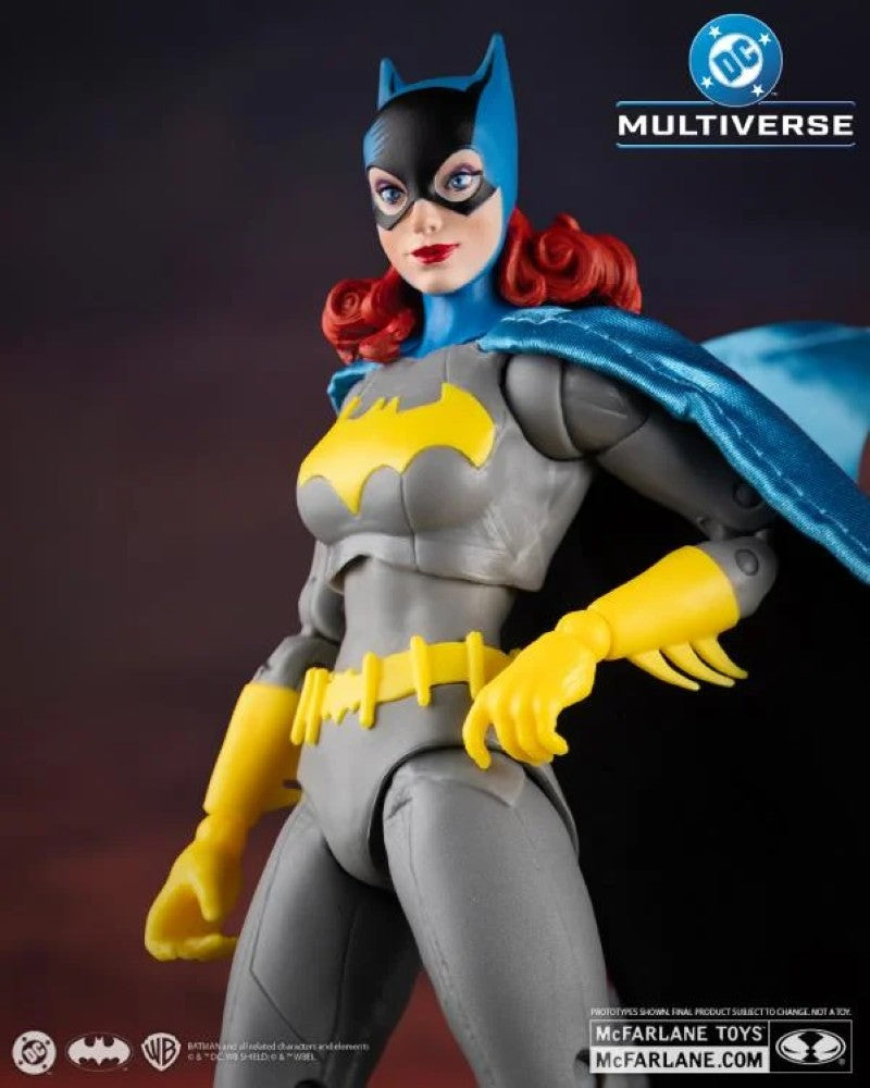 McFarlane DC Multiverse Batgirl action figure showing classic costume with yellow bat symbol and blue cape.